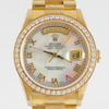 Ladies Rolex. Mother of Pearl and Roman Numeral Dial. Diamond bezel.